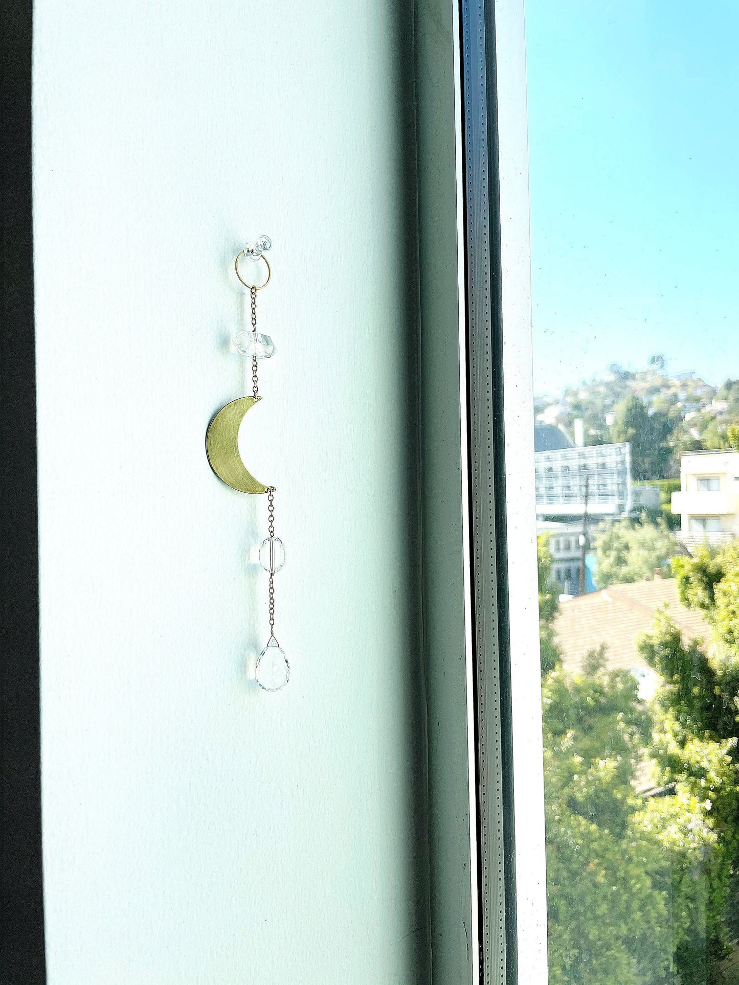 Modern Brass Crescent Moon & Clear Quartz Wall Hanging – Crystal Sun Catcher