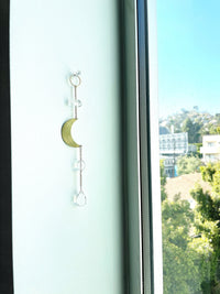Modern Brass Crescent Moon & Clear Quartz Wall Hanging – Crystal Sun Catcher
