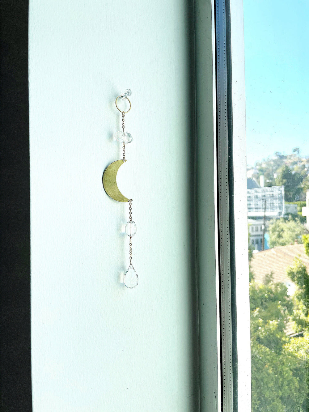 Modern Brass Crescent Moon & Clear Quartz Wall Hanging – Crystal Sun Catcher