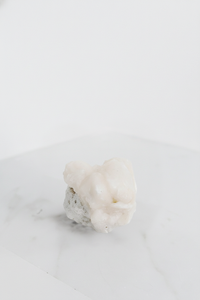 Pink Stilbite Quartz – Brass Claw Crystal Display