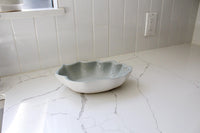 Stoneware Shell Bowl Coastal Design Collection Modern Kitchen Accent White Ceramic Construction Blue Interior Finish Contemporary Home Decor Beautiful Serving Piece Elegant Display Essential Matte Surface Premium Quality Dining Collection